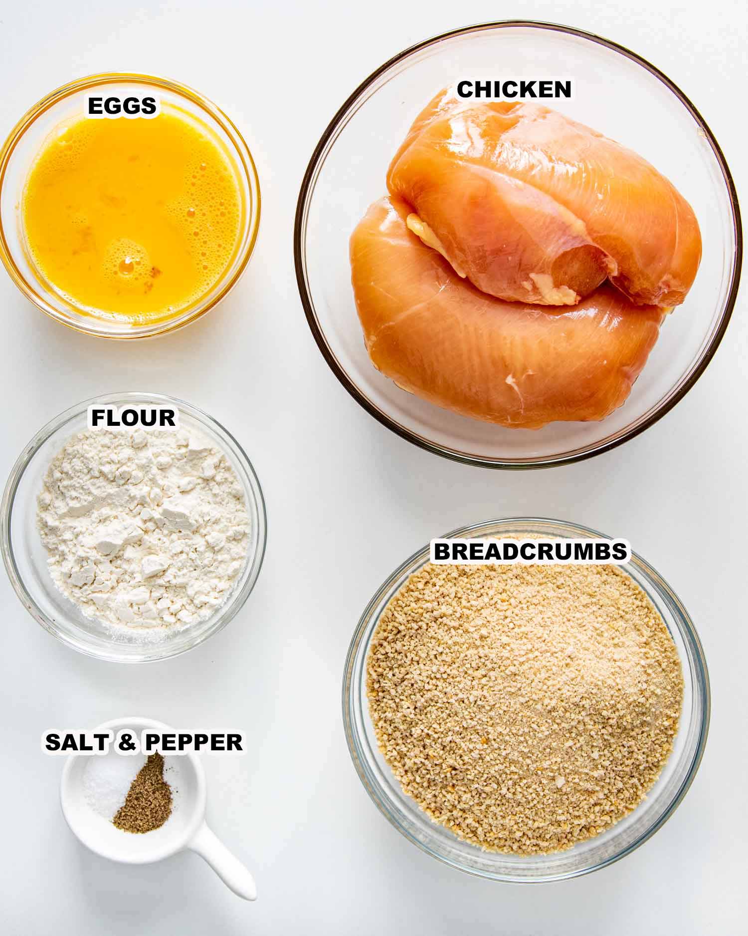 ingredients needed to make chicken katsu with tonkatsu sauce.