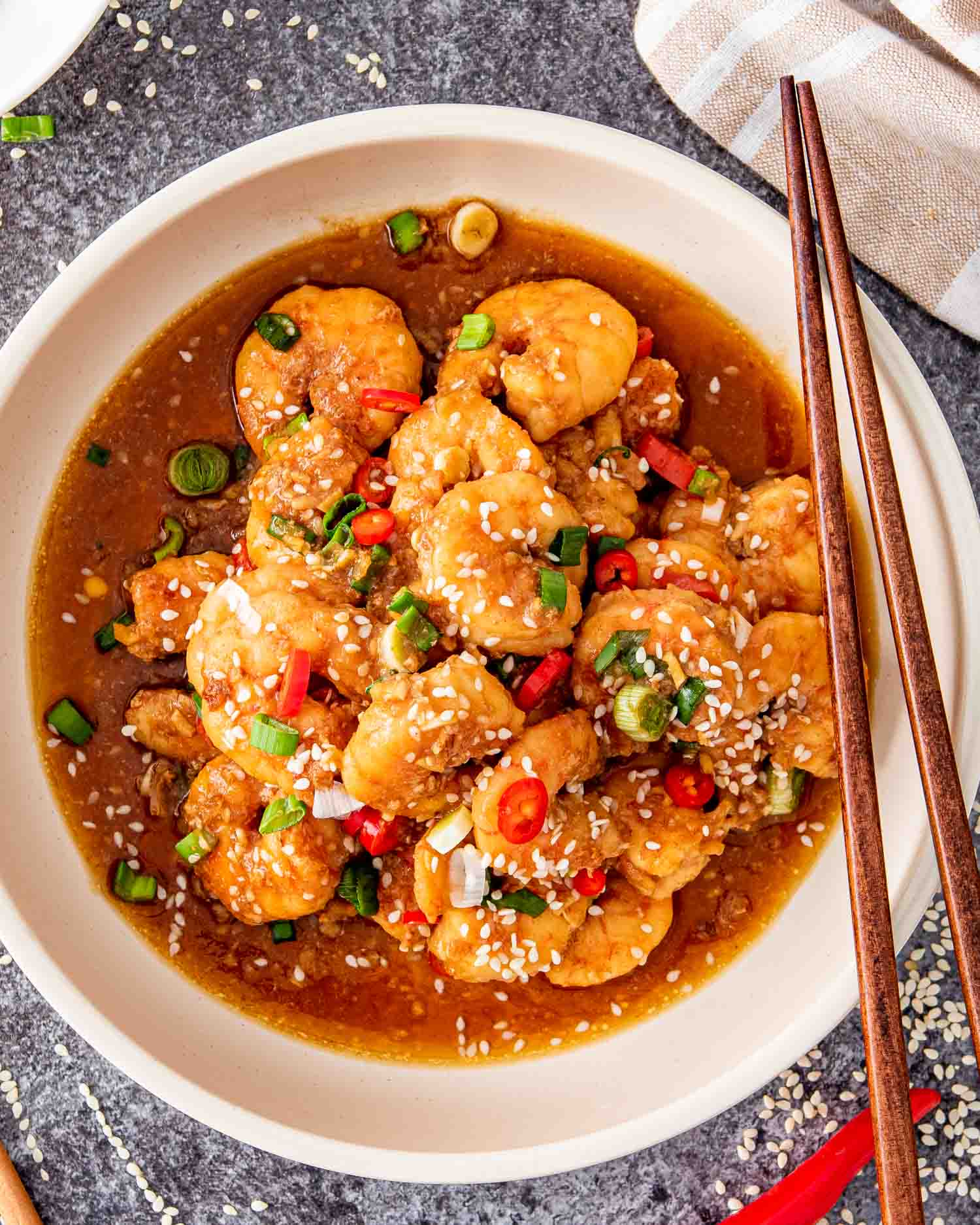 asian garlic shrimp in a white bowl.