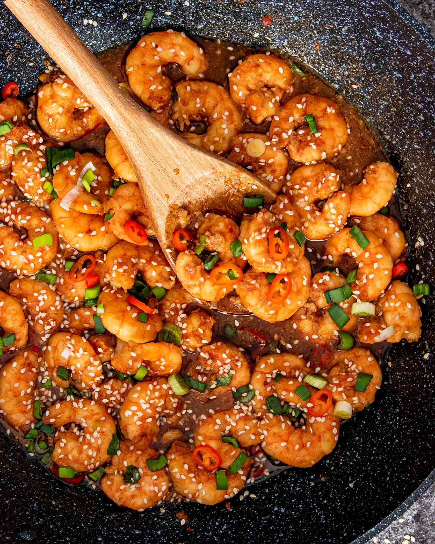 asian garlic shrimp in a wok.