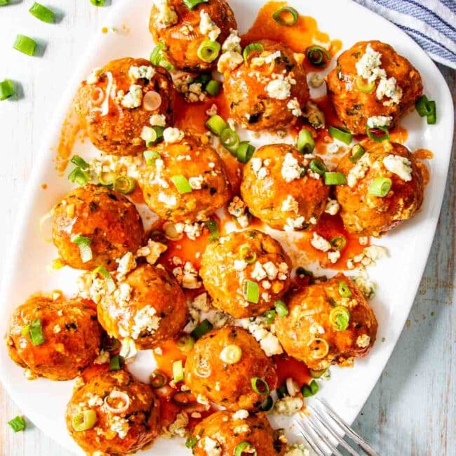 buffalo chicken meatballs on a serving platter.