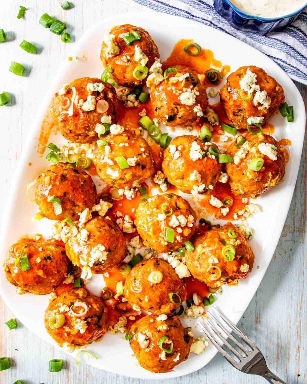 buffalo chicken meatballs on a serving platter.
