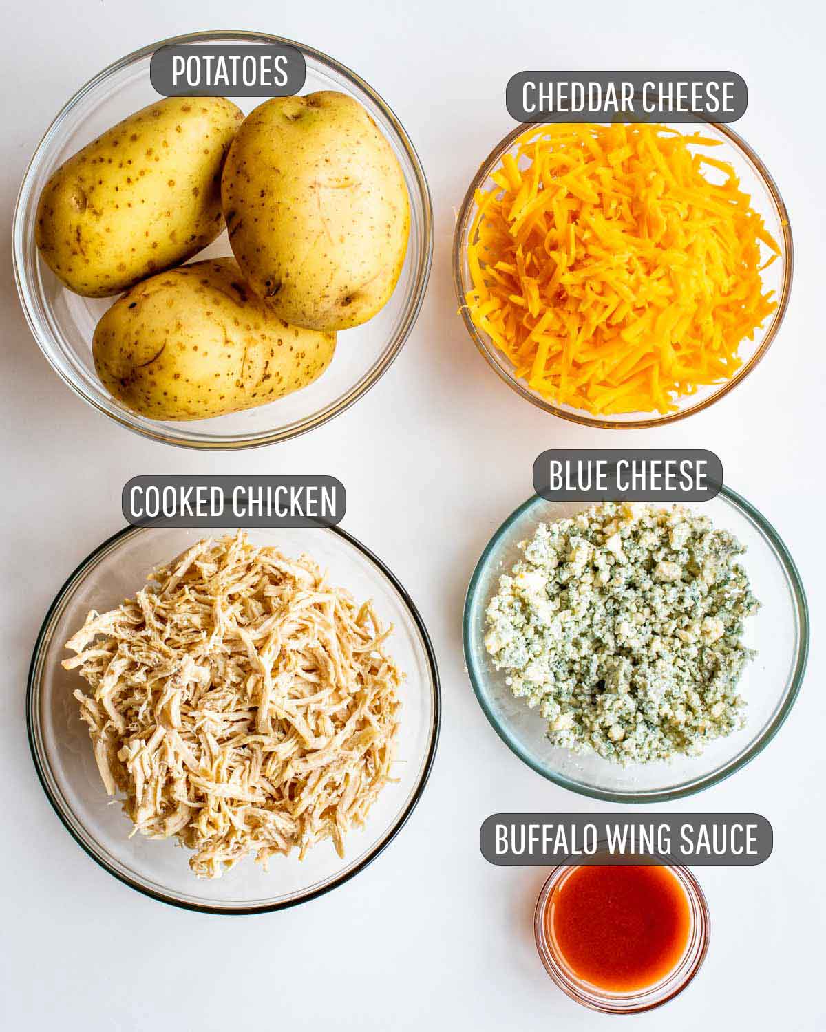 overhead shot of ingredients needed to make buffalo chicken potato skins.
