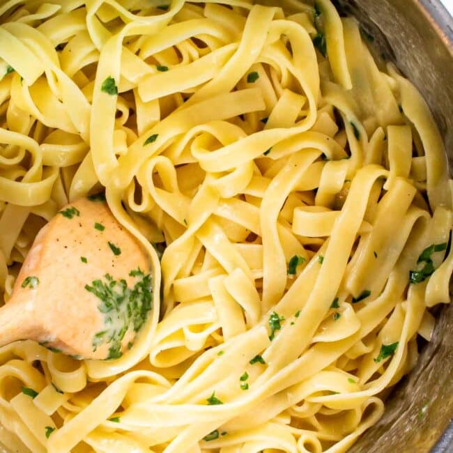 freshly made buttered noodles in a saucepan.