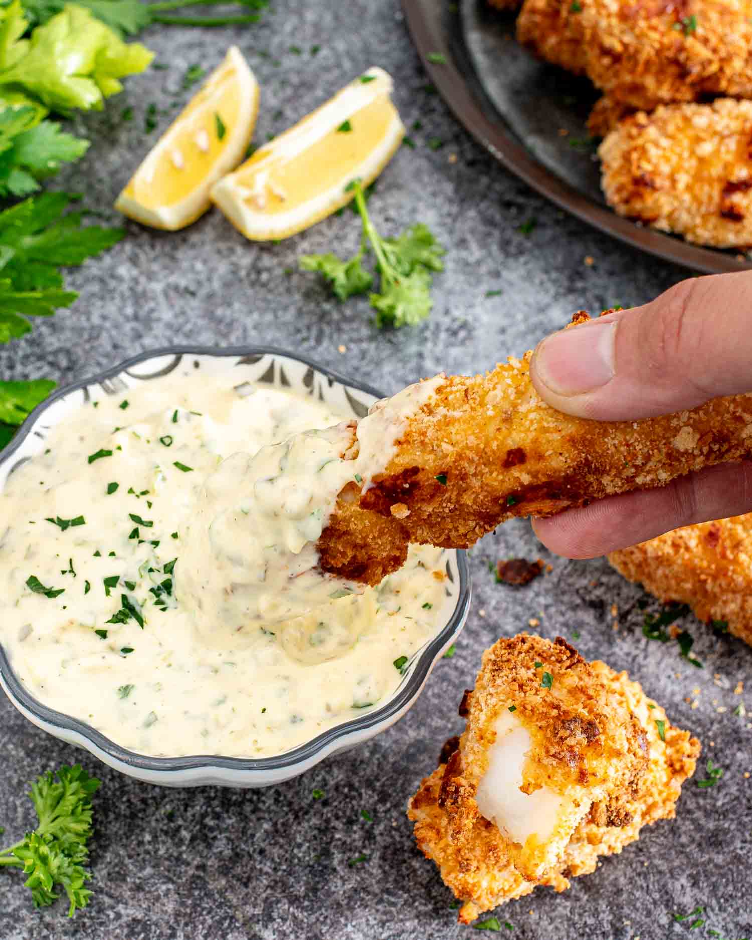 a fish stick dipped in tartar sauce.