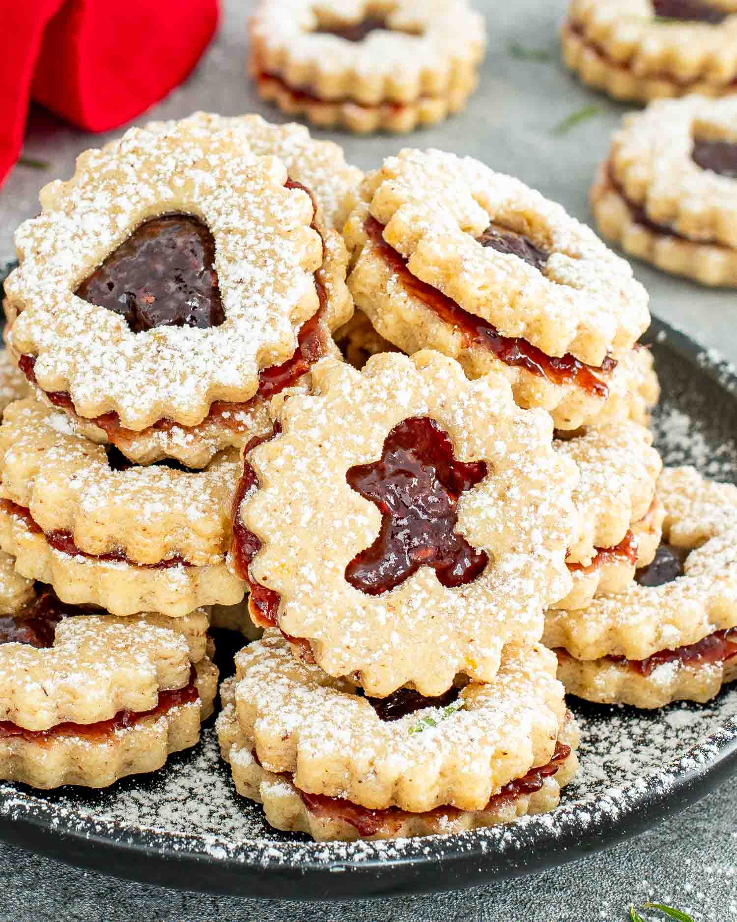 a plate with linzer cookies.