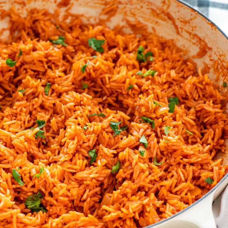 closeup shot of mexican rice in a dutch oven.