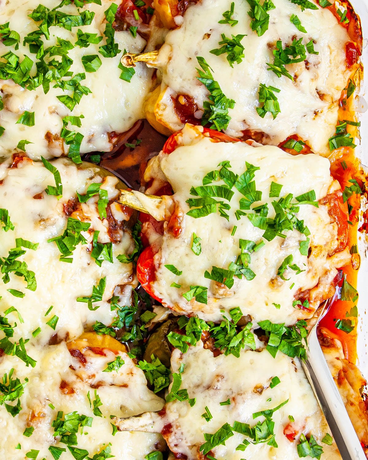 overhead shot of mexican stuffed peppers in a casserole dish