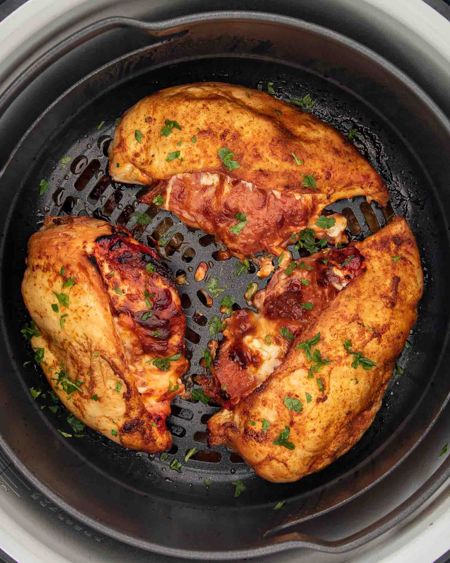 pizza stuffed chicken breasts in an air fryer.