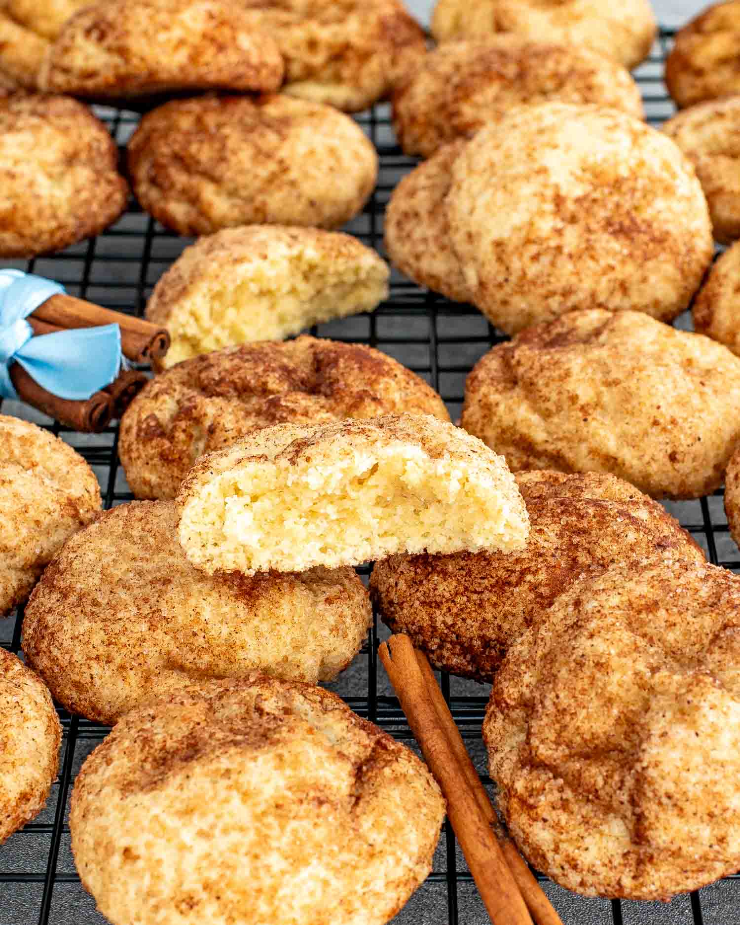snickerdoodle cookies on a cooling rack.
