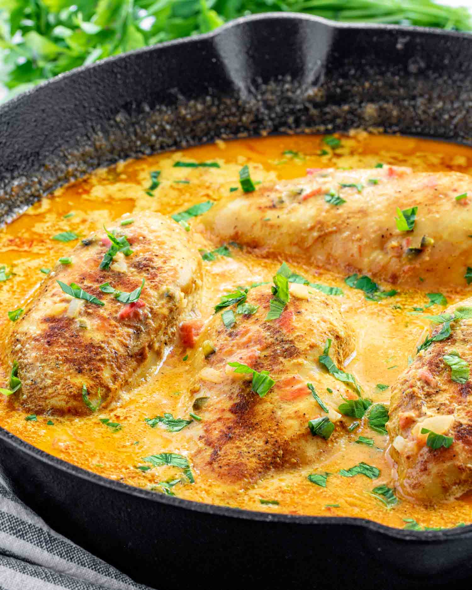 spicy brazilian coconut chicken in a skillet.