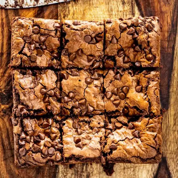 cut up brownies on a cutting board.