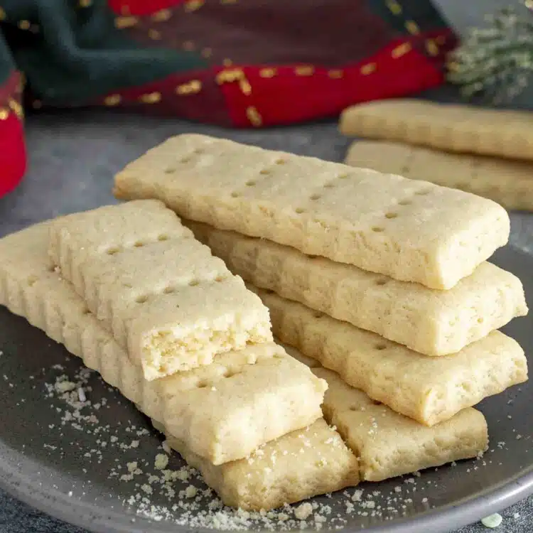 freshly baked shortbread cookies on a gray plate.