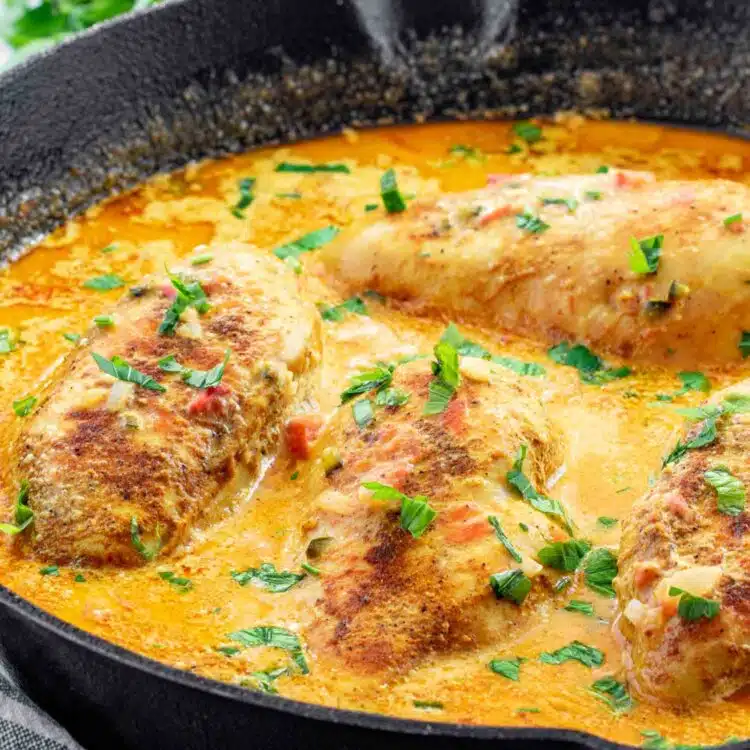 spicy brazilian coconut chicken in a skillet.