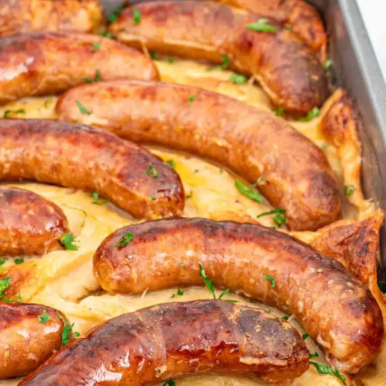 fresh out of the oven toad in the hole in a baking dish.