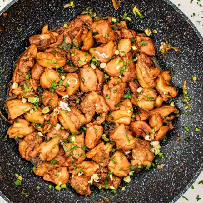 freshly made Vietnamese ginger chicken in a wok.